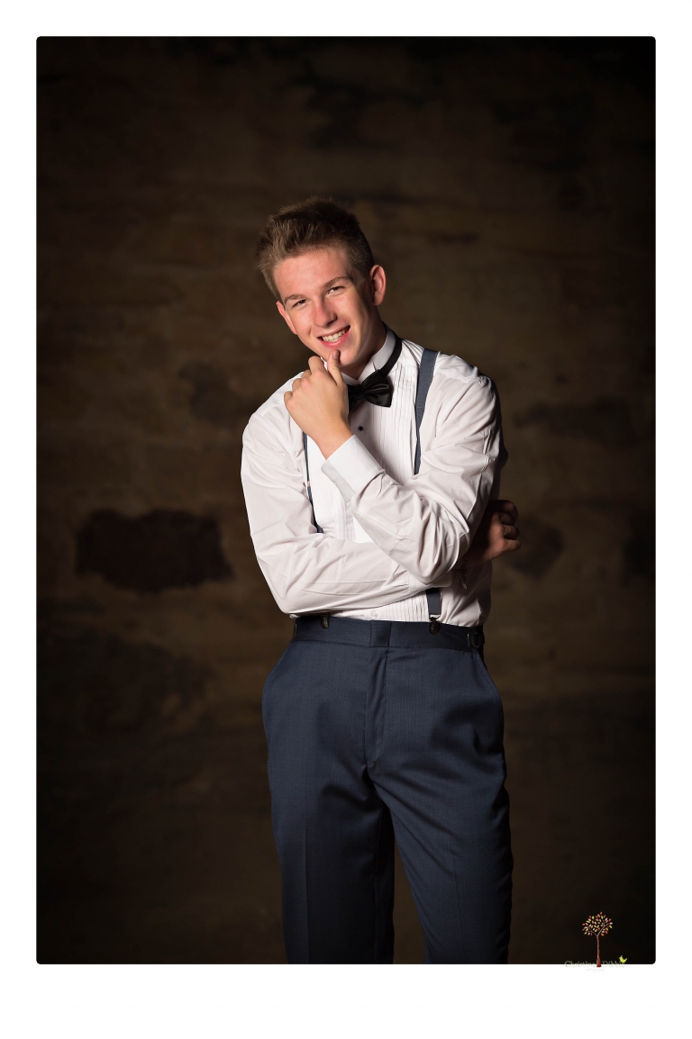 Summerville Senior Portrait photographer Christine Dibble of Sonora takes senior portraits of a boy in a kilt, a nerd scene, an explosion and a tuxedo at Knights Ferry.