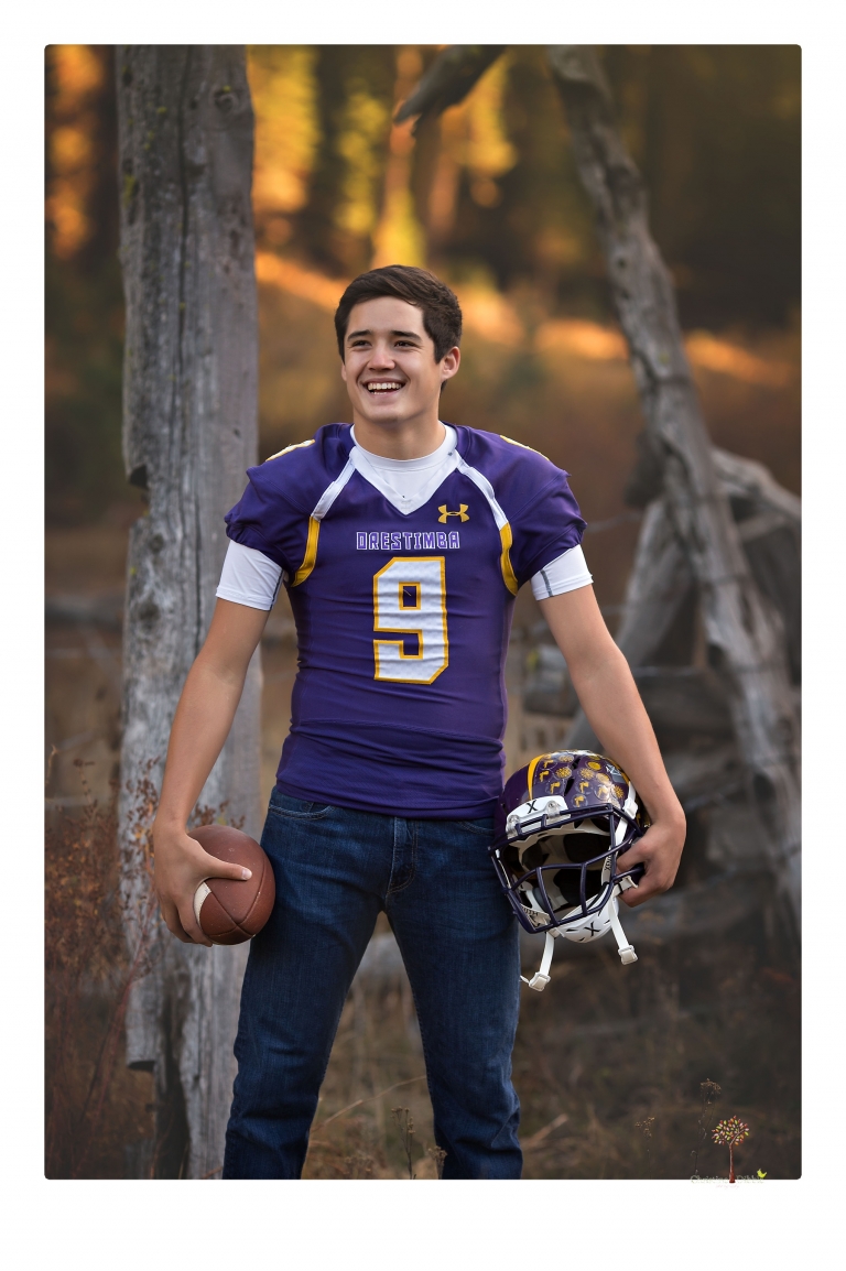Orestimba senior portrait photographer Christine Dibble Photography of Sonora takes senior and family portraits of a football, baseball and basketball player in Long Barn.