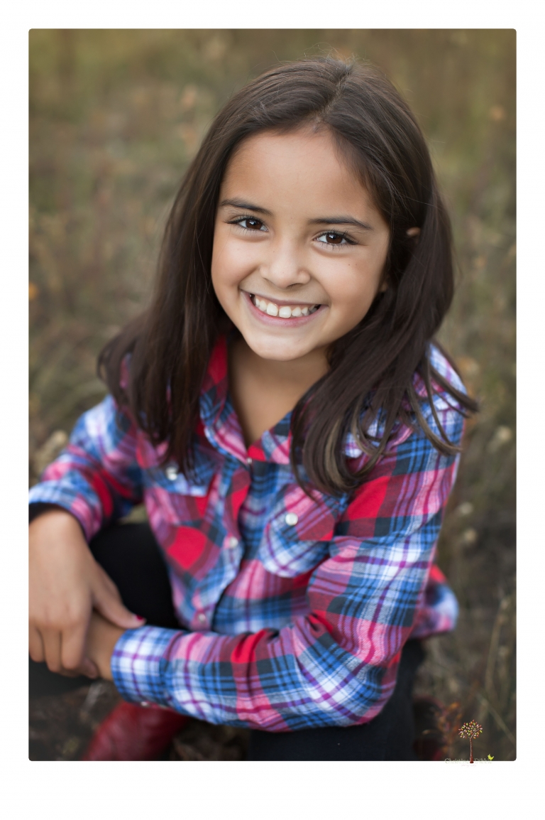 Orestimba senior portrait photographer Christine Dibble Photography of Sonora takes senior and family portraits of a football, baseball and basketball player in Long Barn.