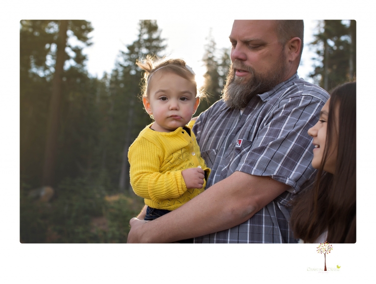 Sonora family photographer Christine Dibble Photography takes family portraits under Chair 10 at Dodge Ridge ski area.