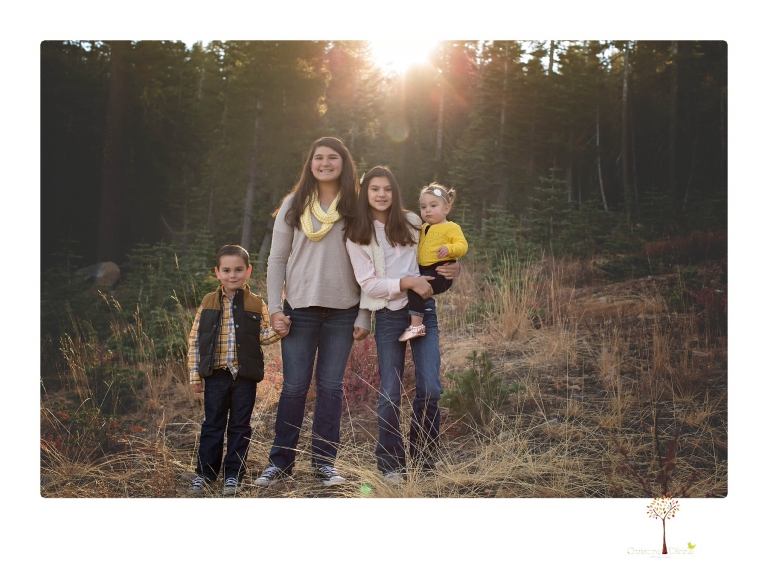 Sonora family photographer Christine Dibble Photography takes family portraits under Chair 10 at Dodge Ridge ski area.