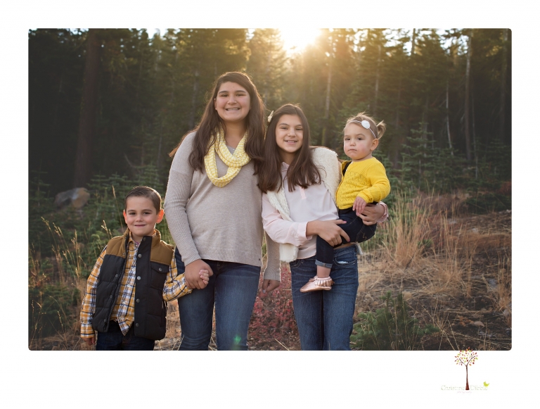 Sonora family photographer Christine Dibble Photography takes family portraits under Chair 10 at Dodge Ridge ski area.