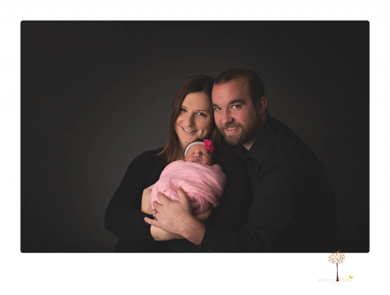 Best Sonora newborn photographer Christine Dibble Photography takes newborn portraits in her studio of a new baby sister and her big brothers and parents.