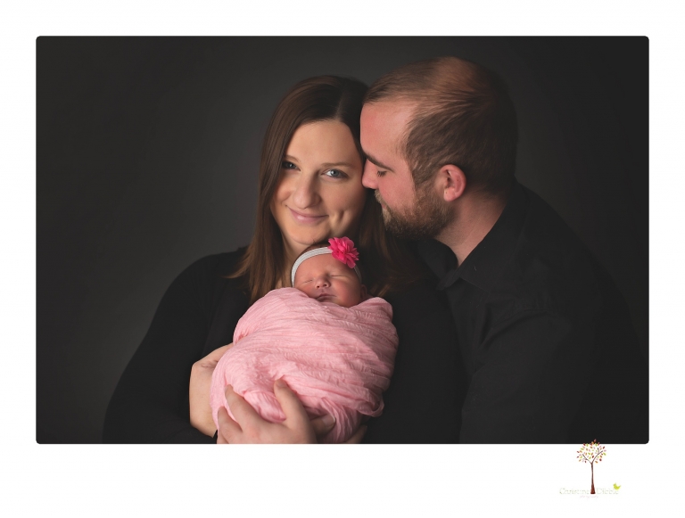 Best Sonora newborn photographer Christine Dibble Photography takes newborn portraits in her studio of a new baby sister and her big brothers and parents.