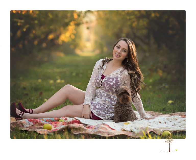 Sonora and Summerville Senior Portrait photographer Christine Dibble Photography takes senior portraits at Indigeny Reserve of a girl with vintage suitcases, a classic Ford Mustang, and her little dog, Pumpkin.