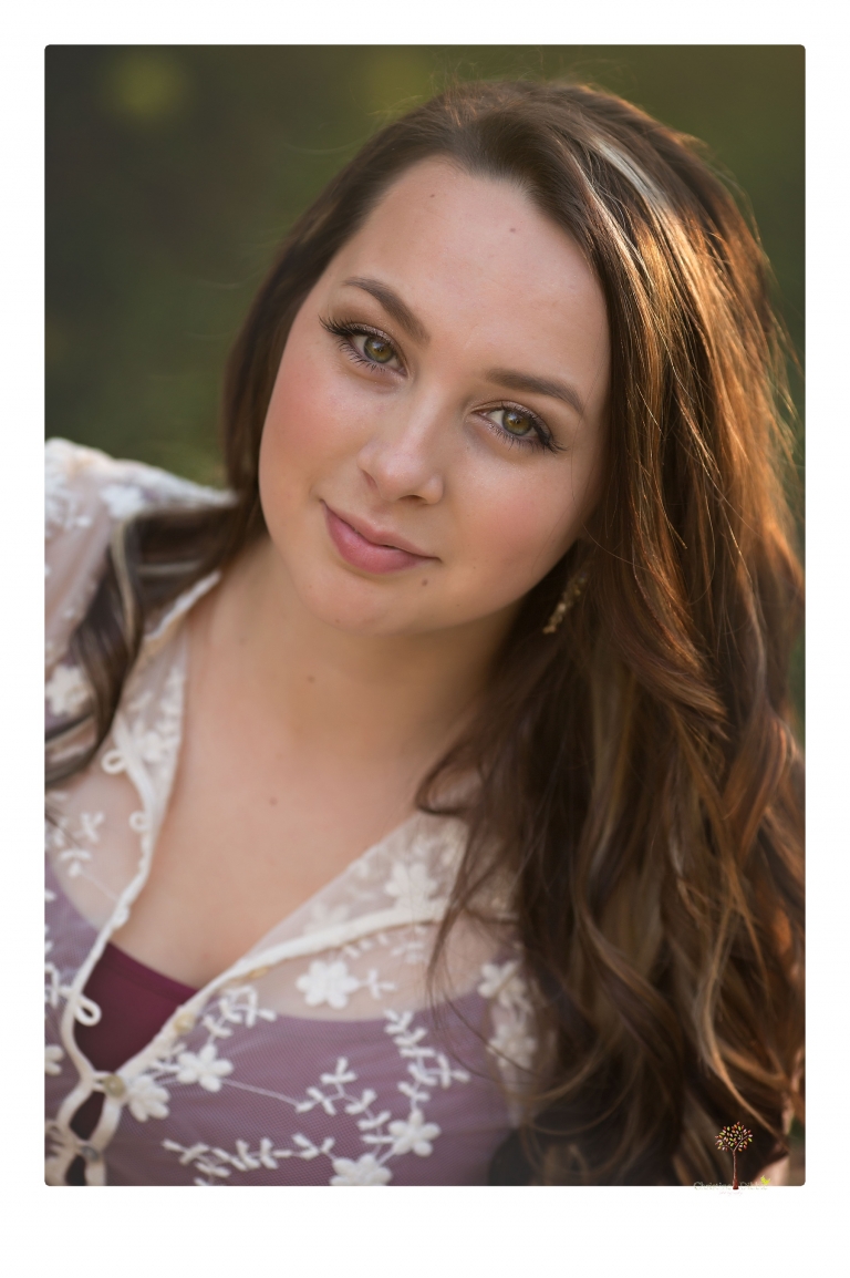 Sonora and Summerville Senior Portrait photographer Christine Dibble Photography takes senior portraits at Indigeny Reserve of a girl with vintage suitcases, a classic Ford Mustang, and her little dog, Pumpkin.