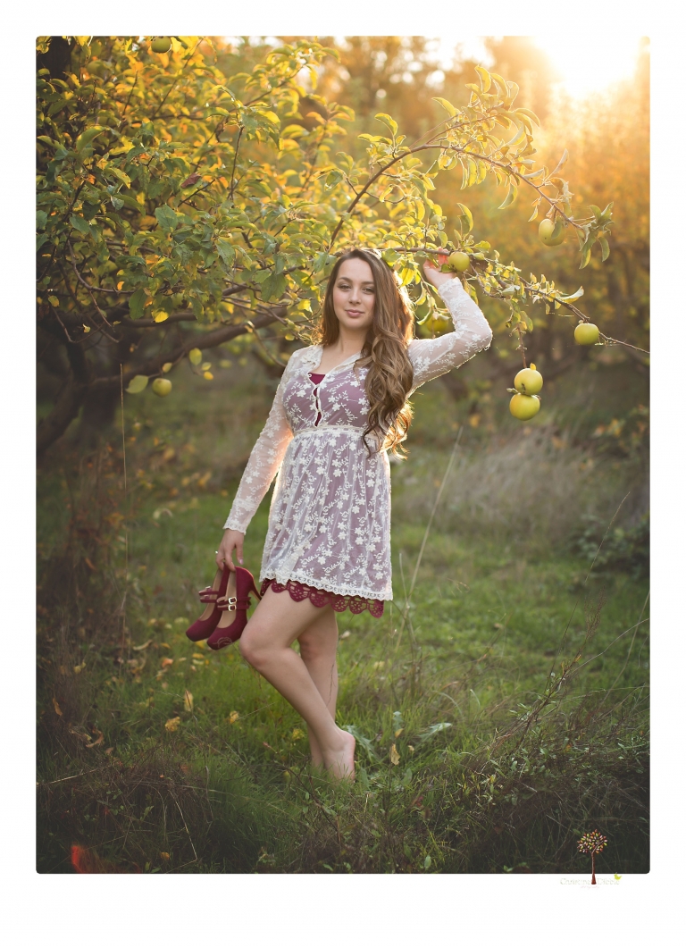 Sonora and Summerville Senior Portrait photographer Christine Dibble Photography takes senior portraits at Indigeny Reserve of a girl with vintage suitcases, a classic Ford Mustang, and her little dog, Pumpkin.