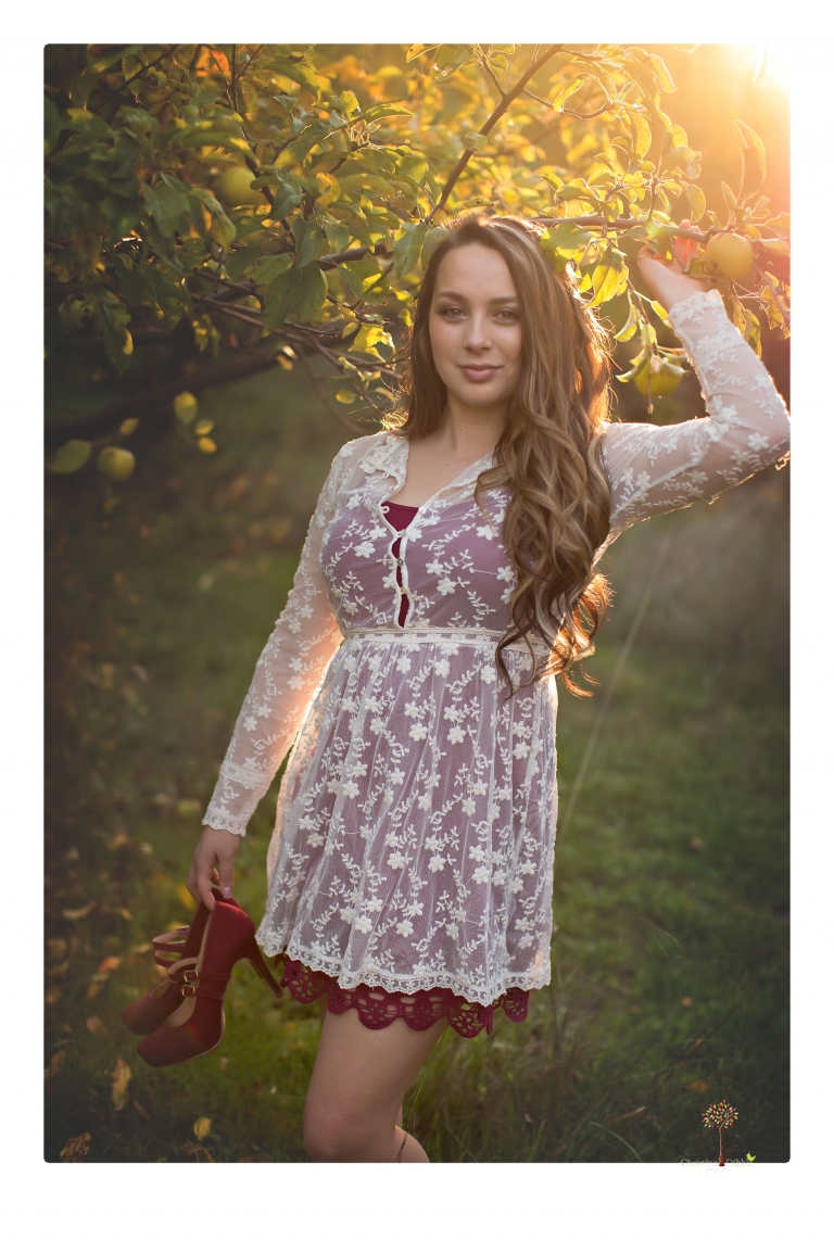 Sonora and Summerville Senior Portrait photographer Christine Dibble Photography takes senior portraits at Indigeny Reserve of a girl with vintage suitcases, a classic Ford Mustang, and her little dog, Pumpkin.