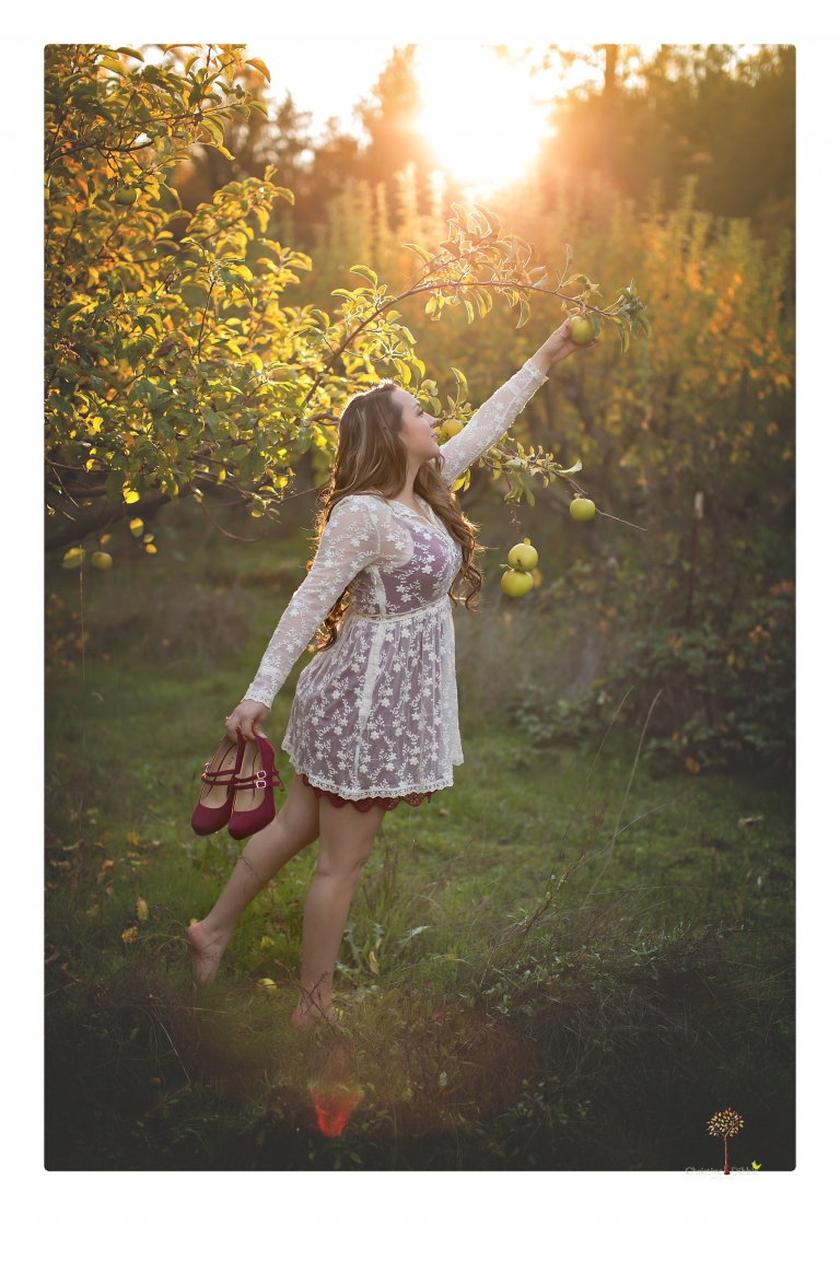 Sonora and Summerville Senior Portrait photographer Christine Dibble Photography takes senior portraits at Indigeny Reserve of a girl with vintage suitcases, a classic Ford Mustang, and her little dog, Pumpkin.