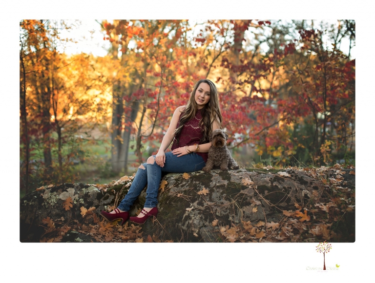 Sonora and Summerville Senior Portrait photographer Christine Dibble Photography takes senior portraits at Indigeny Reserve of a girl with vintage suitcases, a classic Ford Mustang, and her little dog, Pumpkin.
