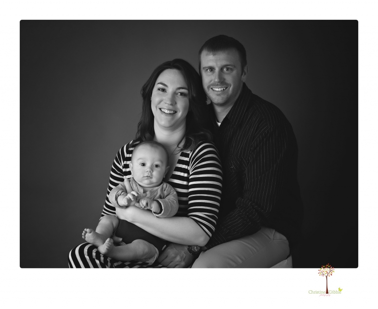 Sonora baby and child photographer Christine Dibble Photography takes three month portraits of a baby boy and his parents in the studio.