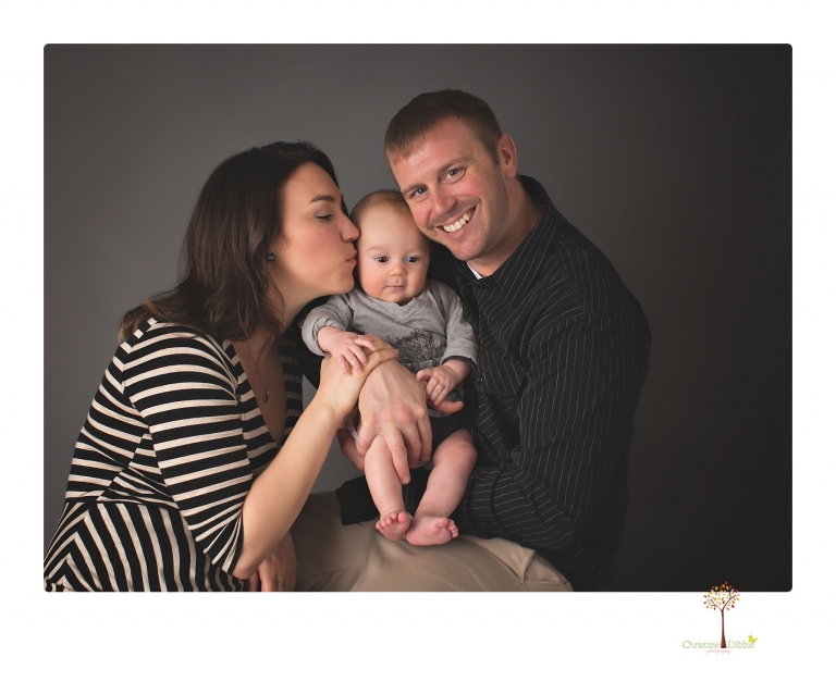 Sonora baby and child photographer Christine Dibble Photography takes three month portraits of a baby boy and his parents in the studio.