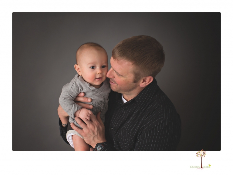 Sonora baby and child photographer Christine Dibble Photography takes three month portraits of a baby boy and his parents in the studio.