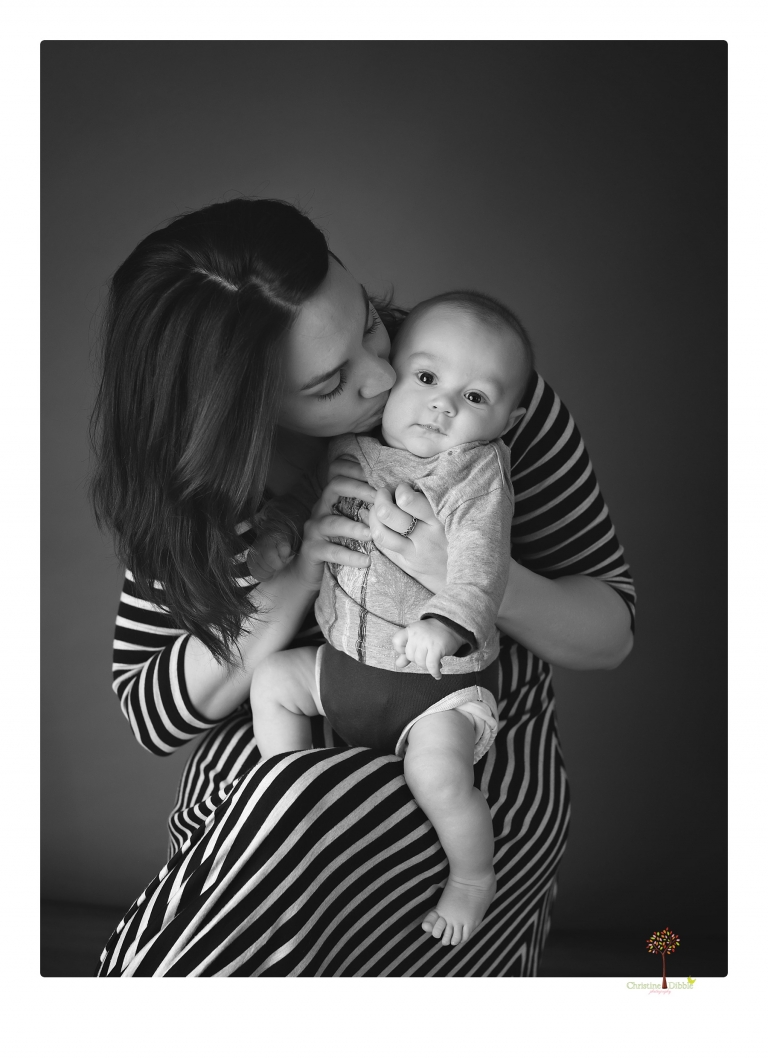 Sonora baby and child photographer Christine Dibble Photography takes three month portraits of a baby boy and his parents in the studio.