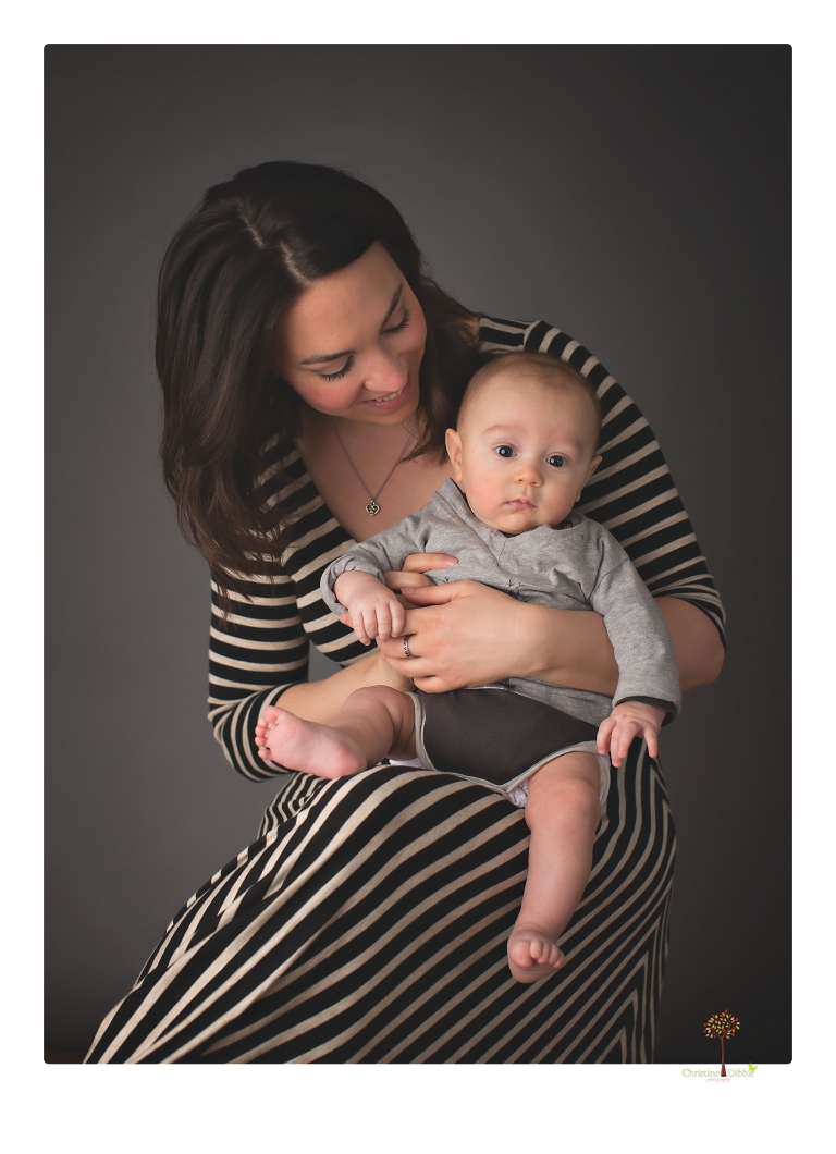 Sonora baby and child photographer Christine Dibble Photography takes three month portraits of a baby boy and his parents in the studio.