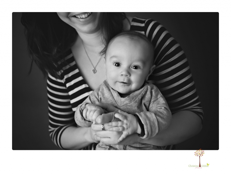 Sonora baby and child photographer Christine Dibble Photography takes three month portraits of a baby boy and his parents in the studio.