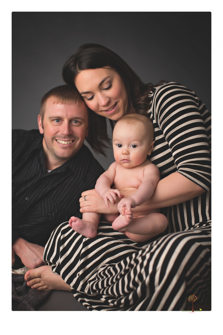 Sonora baby and child photographer Christine Dibble Photography takes three month portraits of a baby boy and his parents in the studio.