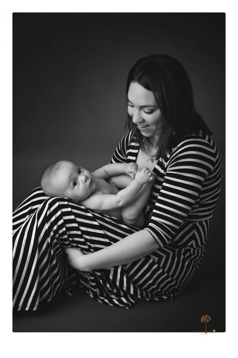 Sonora baby and child photographer Christine Dibble Photography takes three month portraits of a baby boy and his parents in the studio.