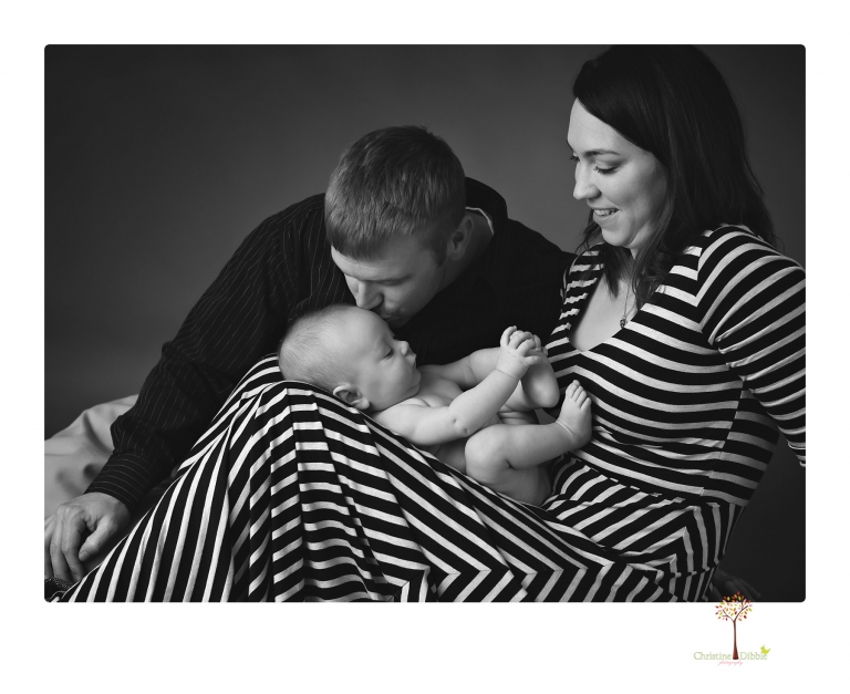 Sonora baby and child photographer Christine Dibble Photography takes three month portraits of a baby boy and his parents in the studio.