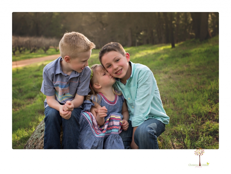 This Indigeny family portrait session, photographed by Christine Dibble Photography of Sonora, included lots of play and group hugs and running around for natural and relaxed family portraits.
