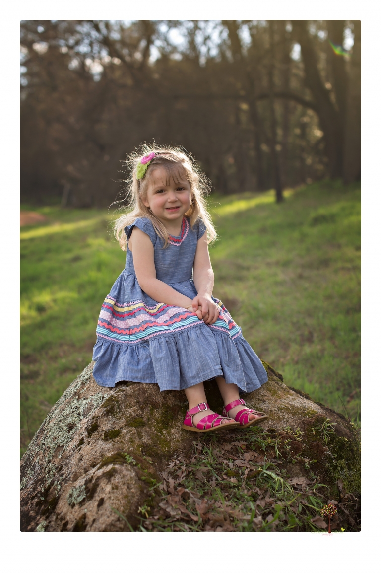 This Indigeny family portrait session, photographed by Christine Dibble Photography of Sonora, included lots of play and group hugs and running around for natural and relaxed family portraits.