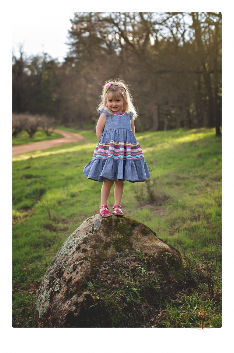 This Indigeny family portrait session, photographed by Christine Dibble Photography of Sonora, included lots of play and group hugs and running around for natural and relaxed family portraits.
