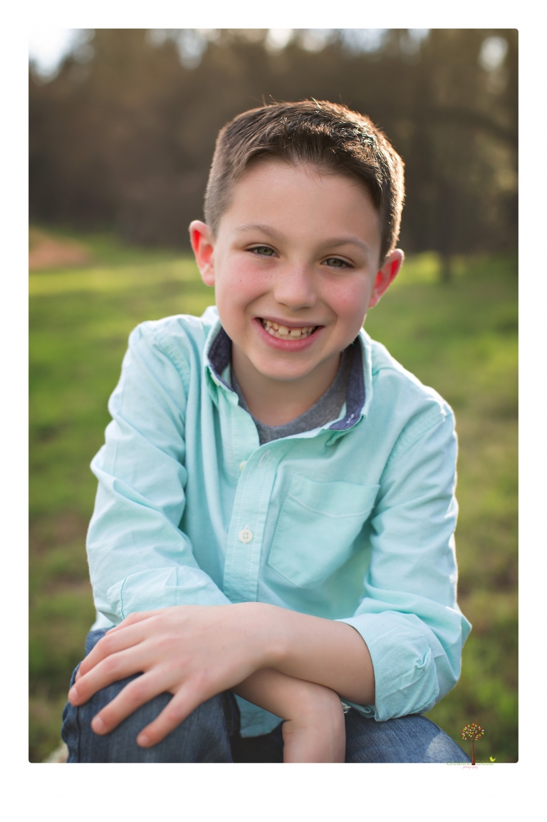This Indigeny family portrait session, photographed by Christine Dibble Photography of Sonora, included lots of play and group hugs and running around for natural and relaxed family portraits.