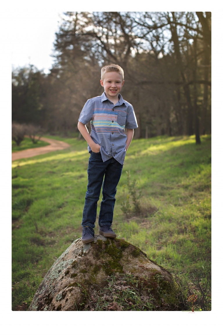 This Indigeny family portrait session, photographed by Christine Dibble Photography of Sonora, included lots of play and group hugs and running around for natural and relaxed family portraits.