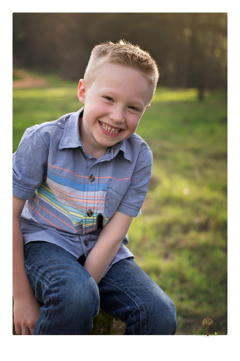 This Indigeny family portrait session, photographed by Christine Dibble Photography of Sonora, included lots of play and group hugs and running around for natural and relaxed family portraits.
