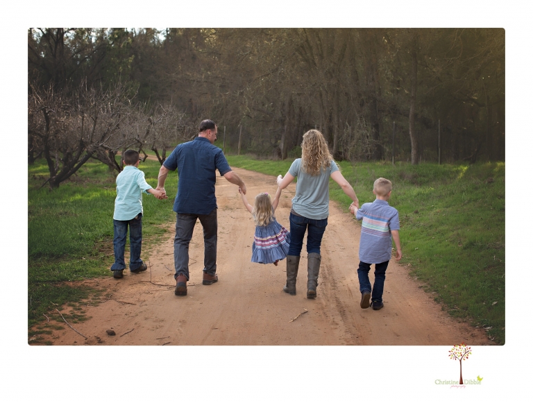 This Indigeny family portrait session, photographed by Christine Dibble Photography of Sonora, included lots of play and group hugs and running around for natural and relaxed family portraits.