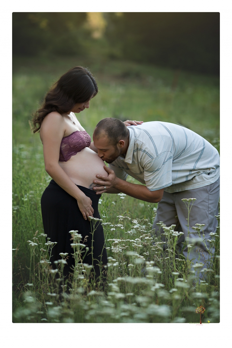 Sonora Maternity Photographer Christine Dibble Photography photographs a maternity session in a flower field.