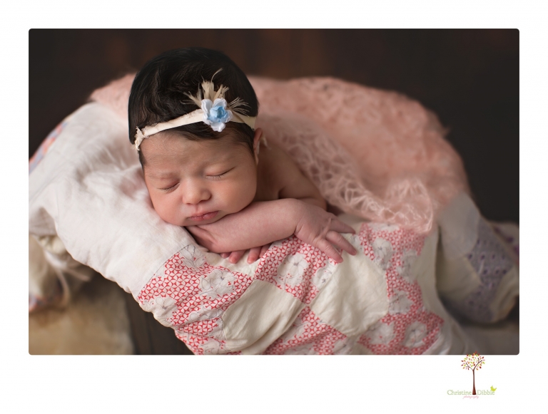 Sonora Newborn Photographer Christine Dibble Photography takes studio newborn portraits of babies using vintage props and linens.