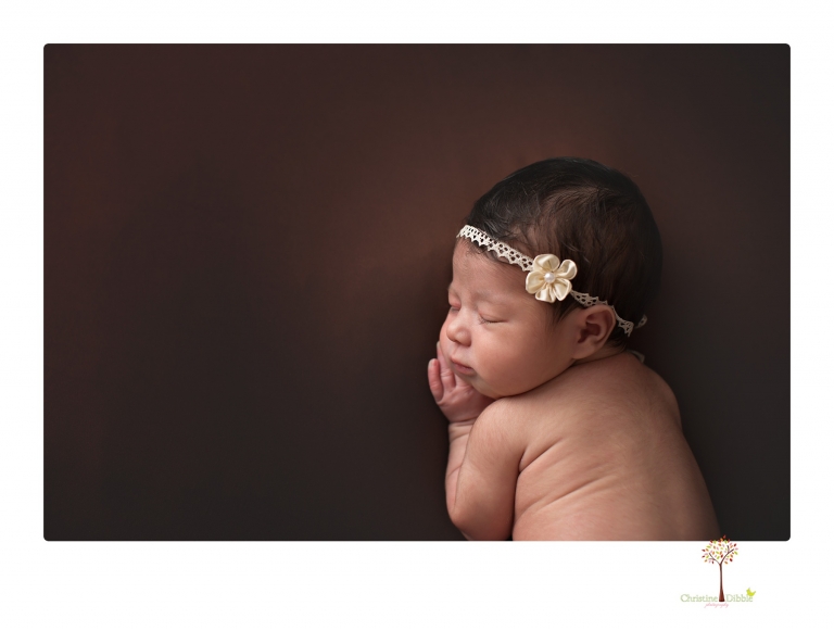 Sonora Newborn Photographer Christine Dibble Photography takes studio newborn portraits of babies using vintage props and linens.