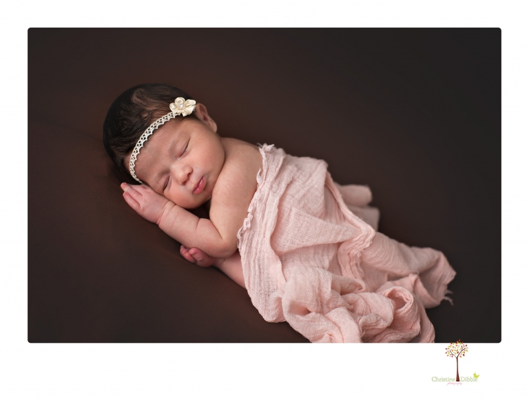 Sonora Newborn Photographer Christine Dibble Photography takes studio newborn portraits of babies using vintage props and linens.