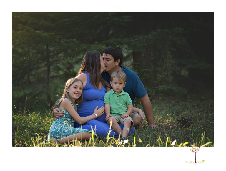 Sonora maternity photographer Christine Dibble Photography takes Long Barn maternity portraits in a field and woods of a mother-to-be and her family.