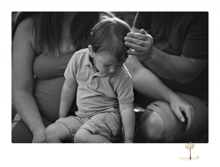 Sonora maternity photographer Christine Dibble Photography takes Long Barn maternity portraits in a field and woods of a mother-to-be and her family.