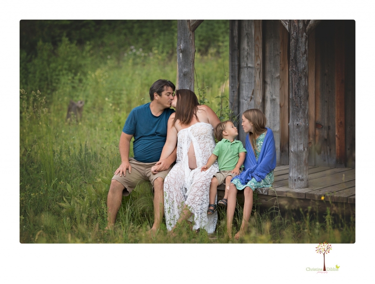 Sonora maternity photographer Christine Dibble Photography takes Long Barn maternity portraits in a field and woods of a mother-to-be and her family.