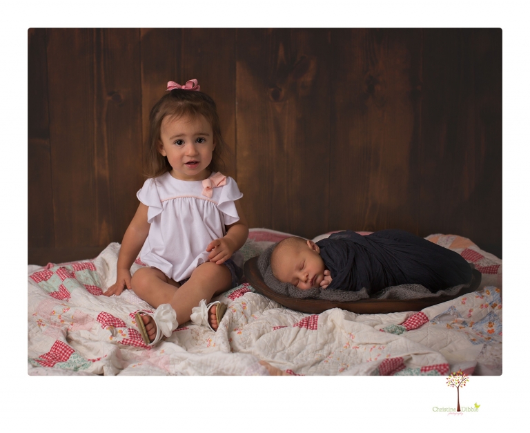 Sonora newborn photographer Christine Dibble Photography takes older newborn portraits of a baby boy with his big sister and mother.