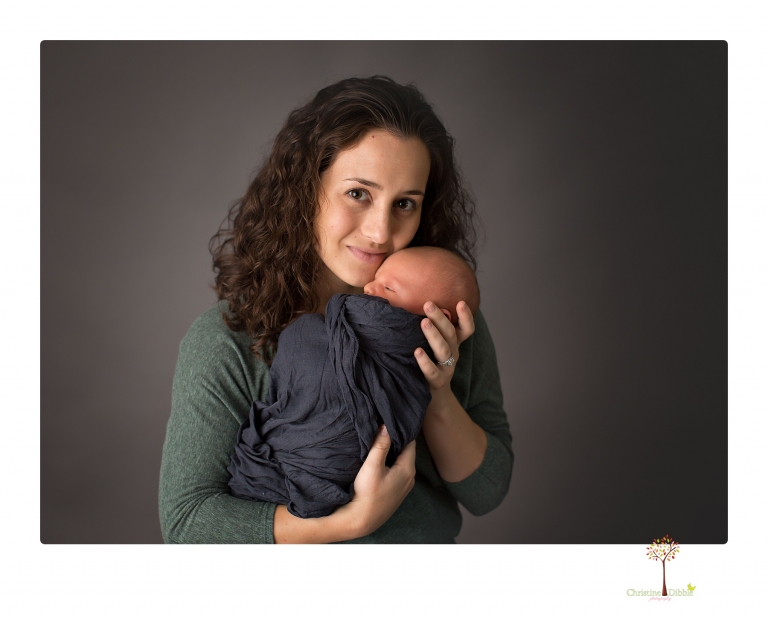 Sonora newborn photographer Christine Dibble Photography takes older newborn portraits of a baby boy with his big sister and mother.