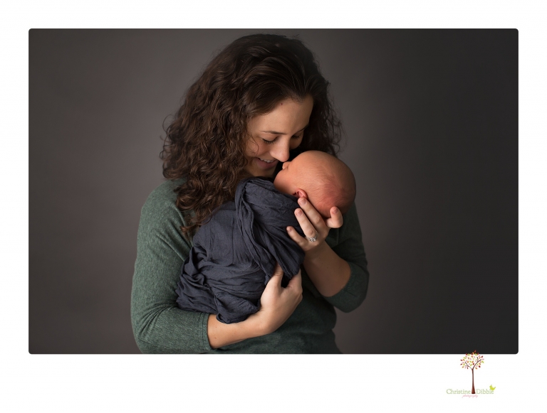 Sonora newborn photographer Christine Dibble Photography takes older newborn portraits of a baby boy with his big sister and mother.