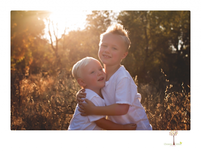 Sonora maternity photographer Christine Dibble Photography takes unique maternity portraits in the river at Knights Ferry of a family and mother of three.