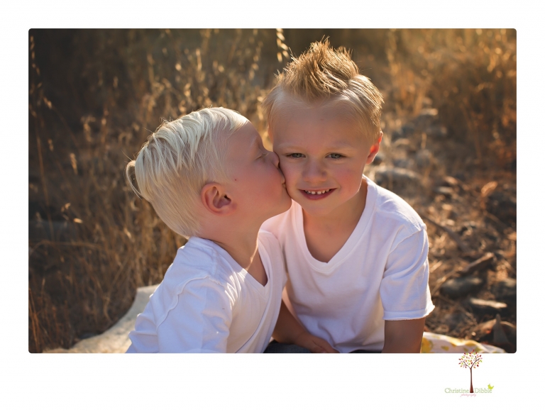 Sonora maternity photographer Christine Dibble Photography takes unique maternity portraits in the river at Knights Ferry of a family and mother of three.