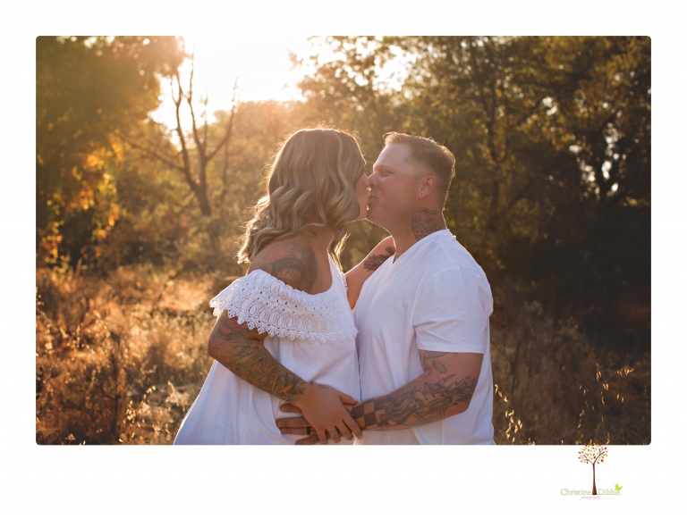 Sonora maternity photographer Christine Dibble Photography takes unique maternity portraits in the river at Knights Ferry of a family and mother of three.