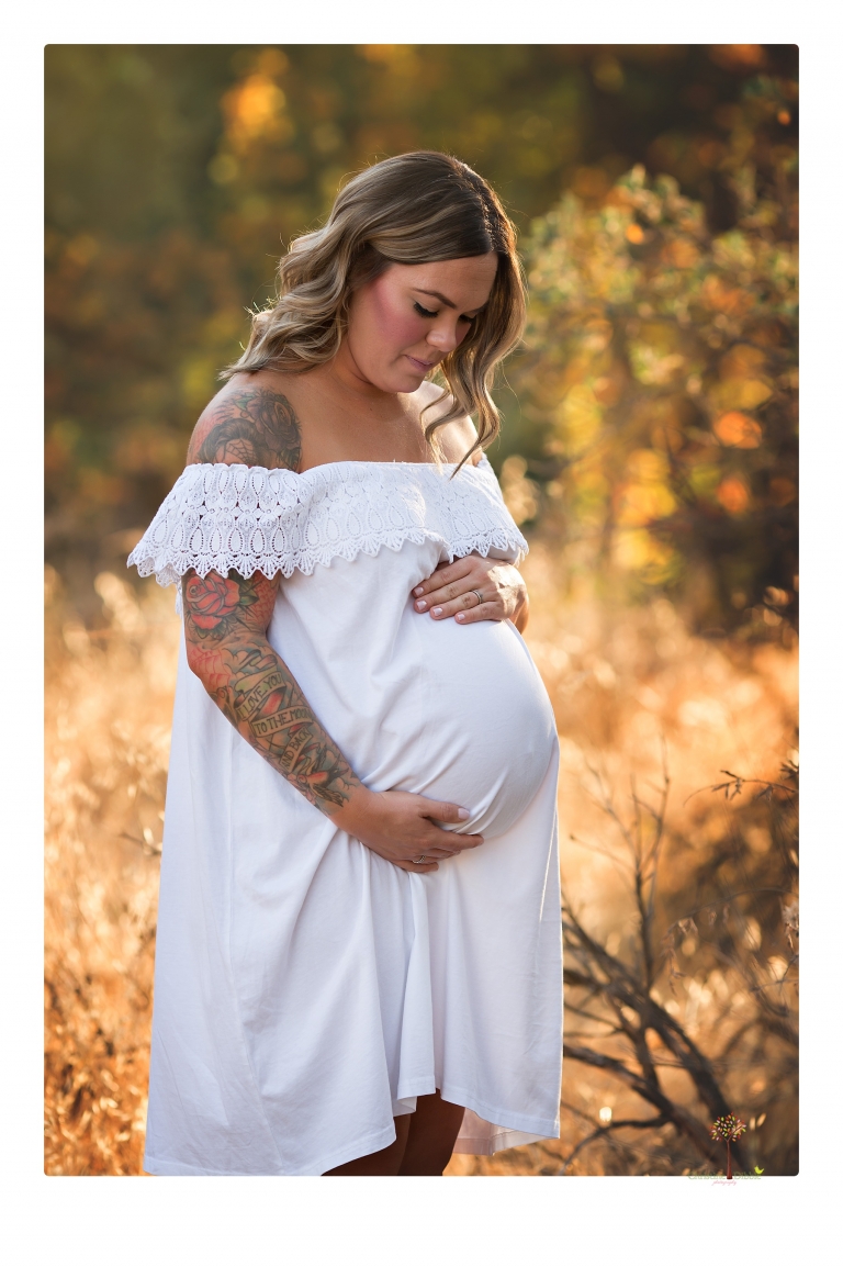 Sonora maternity photographer Christine Dibble Photography takes unique maternity portraits in the river at Knights Ferry of a family and mother of three.