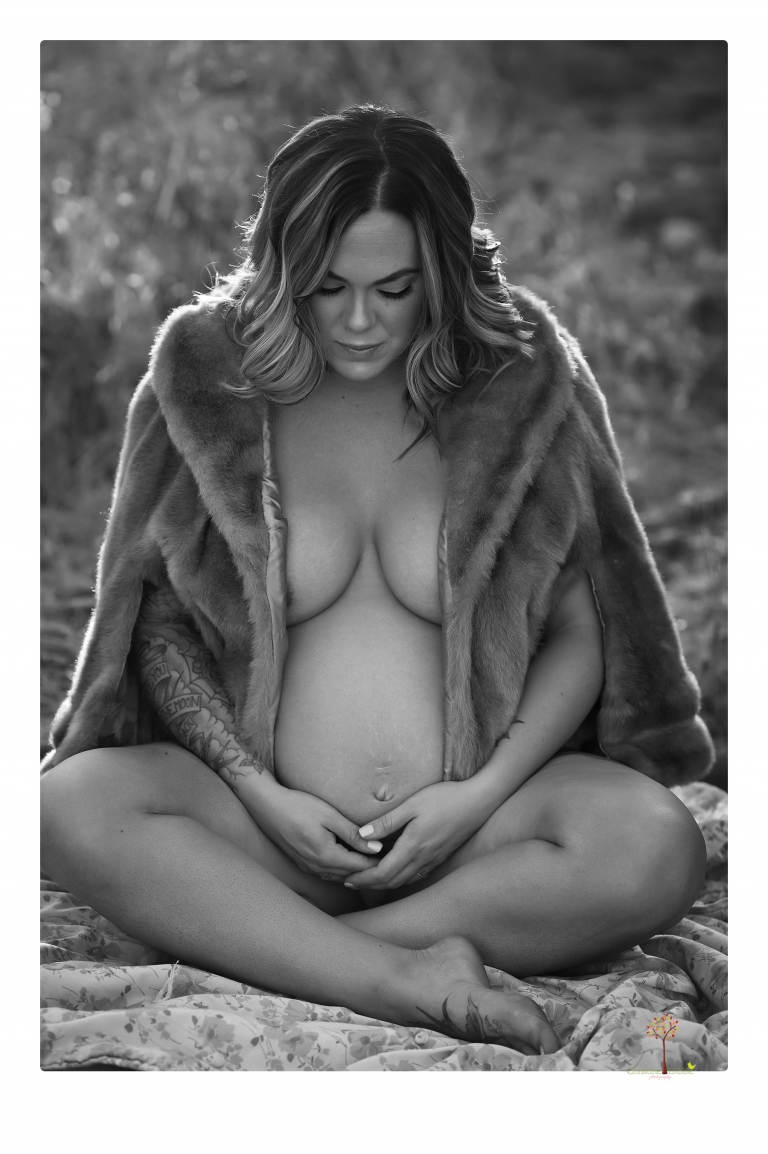 Sonora maternity photographer Christine Dibble Photography takes unique maternity portraits in the river at Knights Ferry of a family and mother of three.