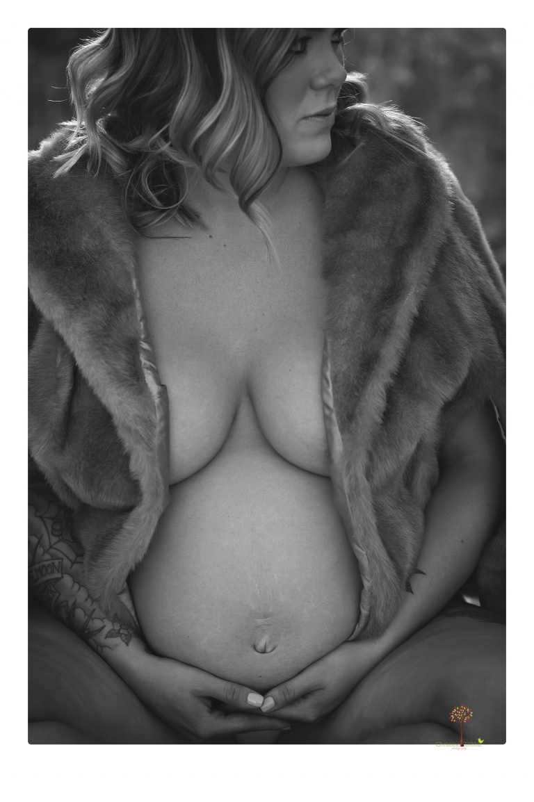 Sonora maternity photographer Christine Dibble Photography takes unique maternity portraits in the river at Knights Ferry of a family and mother of three.