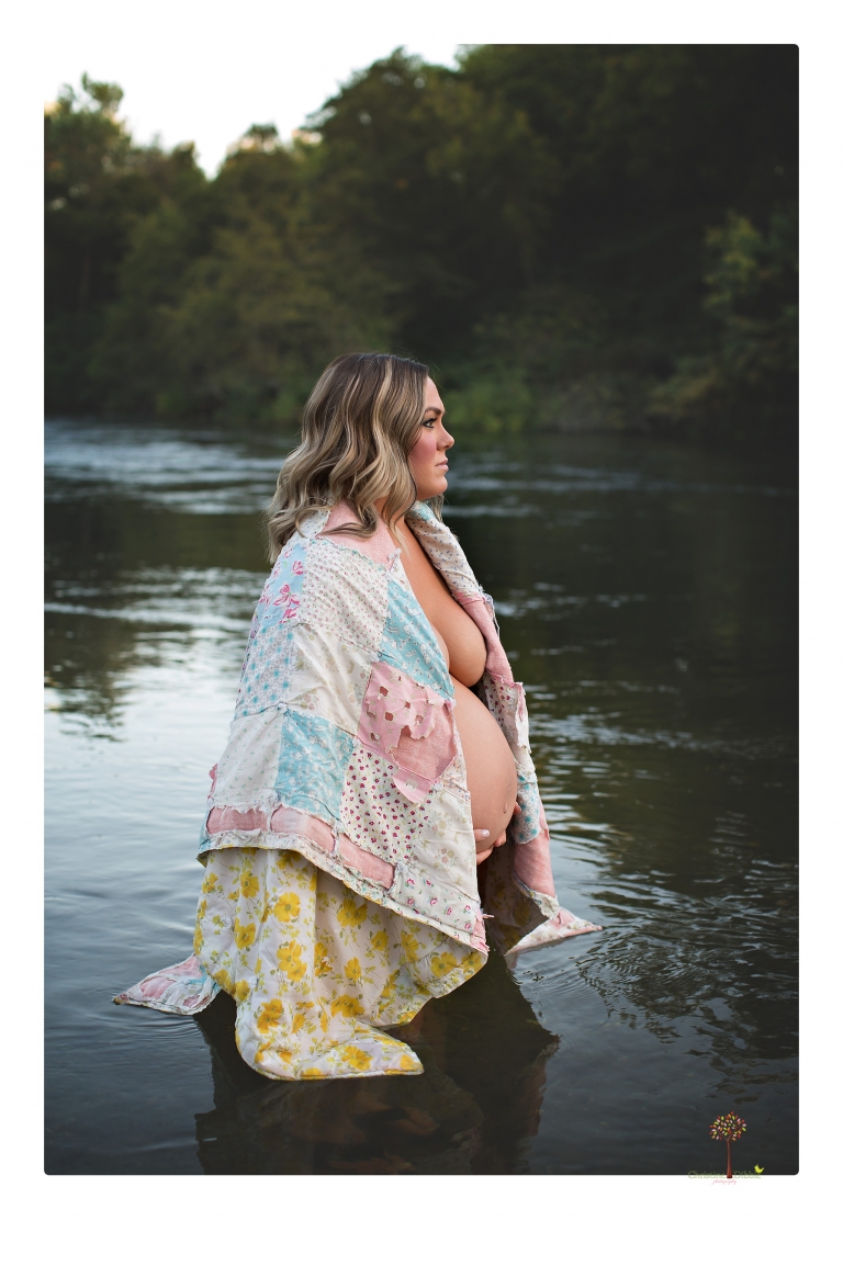 Sonora maternity photographer Christine Dibble Photography takes unique maternity portraits in the river at Knights Ferry of a family and mother of three.