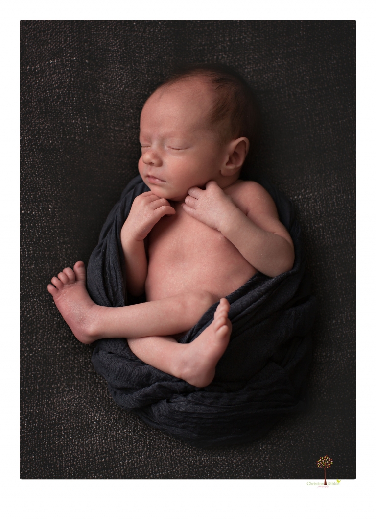 Sonora newborn photographer Christine Dibble Photography takes newborn portraits of a future Harley Davidson fan and his parents.