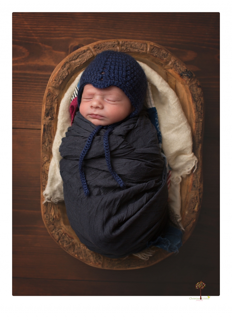 Sonora newborn photographer Christine Dibble Photography takes newborn portraits of a future Harley Davidson fan and his parents.
