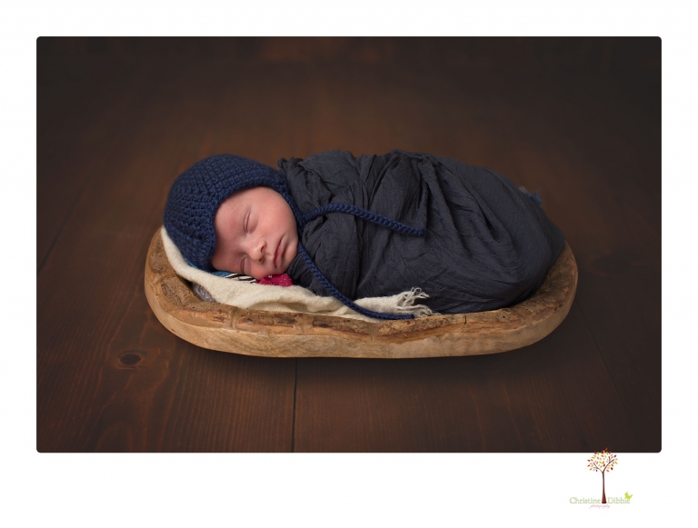 Sonora newborn photographer Christine Dibble Photography takes newborn portraits of a future Harley Davidson fan and his parents.